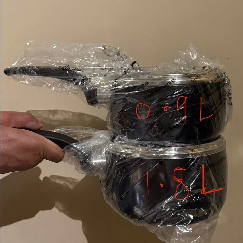Silver and Black T-fal small pots